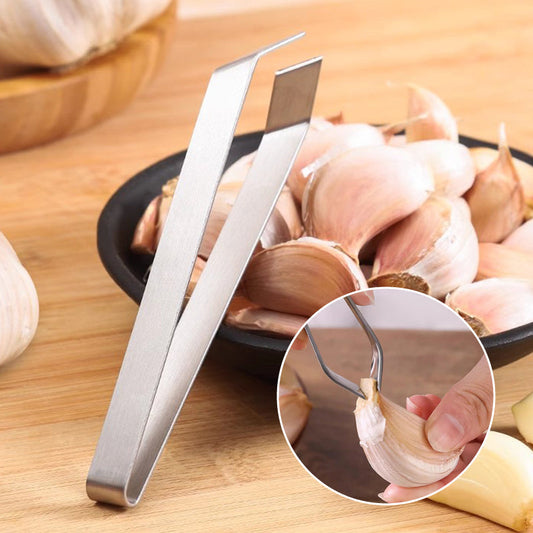 🎉[Kreativ present]🎁Högkvalitativa 304 rostfria stålklämmor för att skala vitlök i köket💥Köp 2 få 3 gratis tidsbegränsat erbjudande